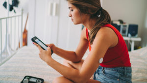 using glucose monitor on bed1256997215